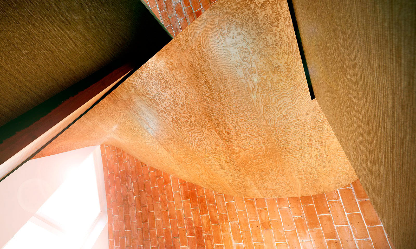 Verity's ceiling. A bespoke hand-crafted, timber ceiling, designed for Crossway, Hawkes Architect's para 55 eco-house. Featured on Grand Designs this unique stucture was manufactured from veneered Japanese birds eye ash and installed by the skilled joiners from Mounts Hill Woodcraft.