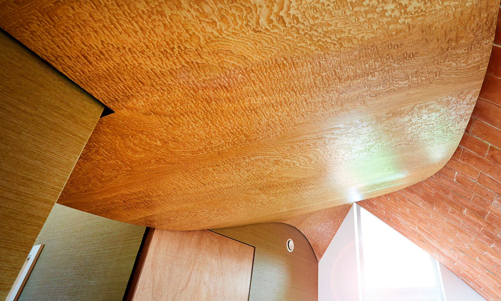 Verity's ceiling. A bespoke hand-crafted, timber ceiling, designed for Crossway, Hawkes Architect's para 55 eco-house. Featured on Grand Designs this unique stucture was manufactured from veneered Japanese birds eye ash and installed by the skilled joiners from Mounts Hill Woodcraf