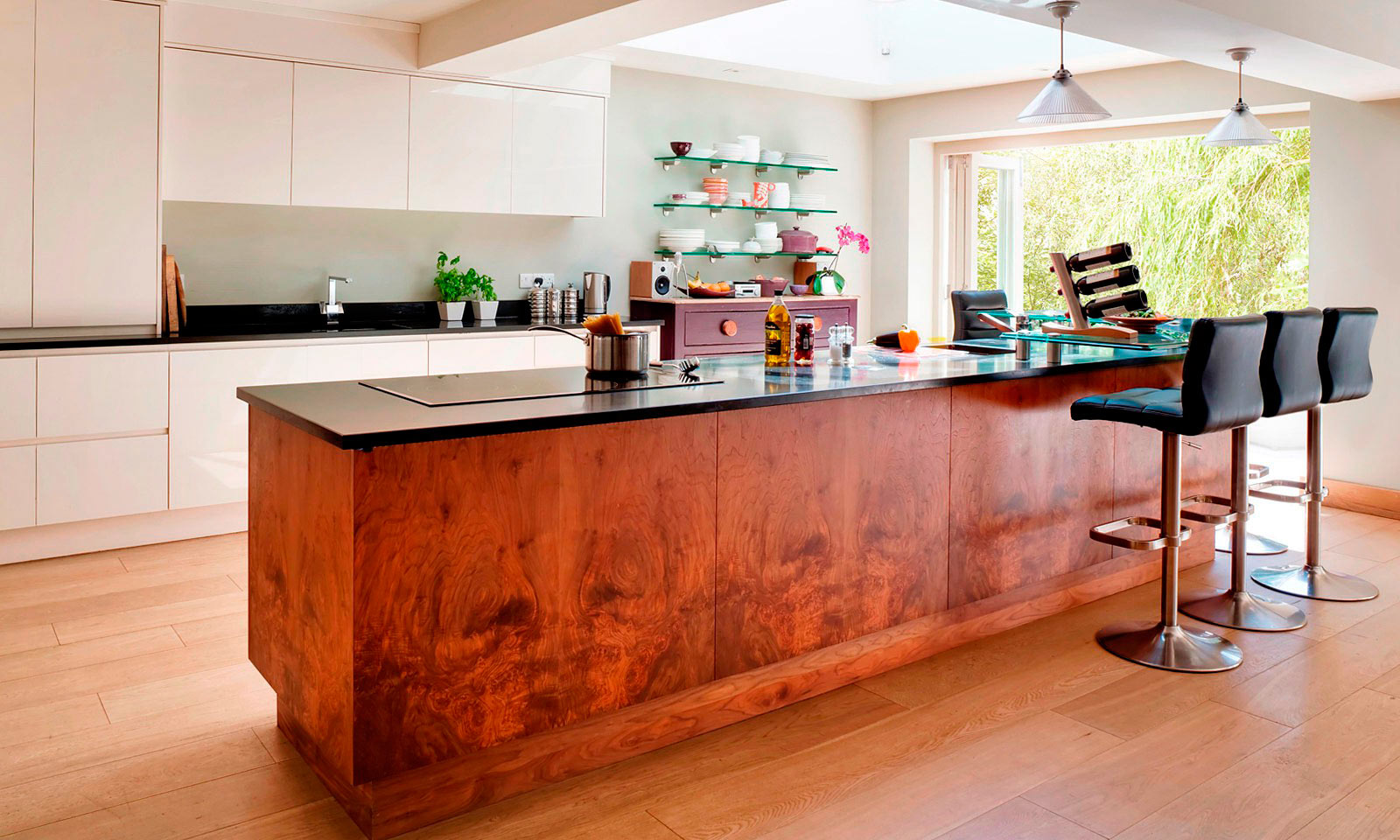 Cranbrook. A modern, bespoke, handmade kitchen in Latte Parapan acrylic and American walnut veneer. A hand-crafted handleless kitchen, manufactured by the skilled cabinet makers at Mounts Hill Woodcraft.